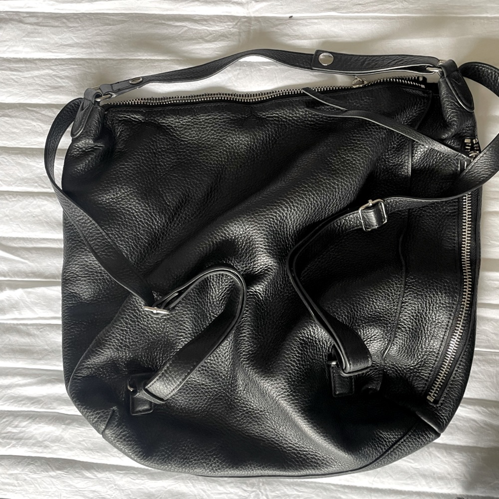 Womens universal purse ( backpack or throw over the shoulder)